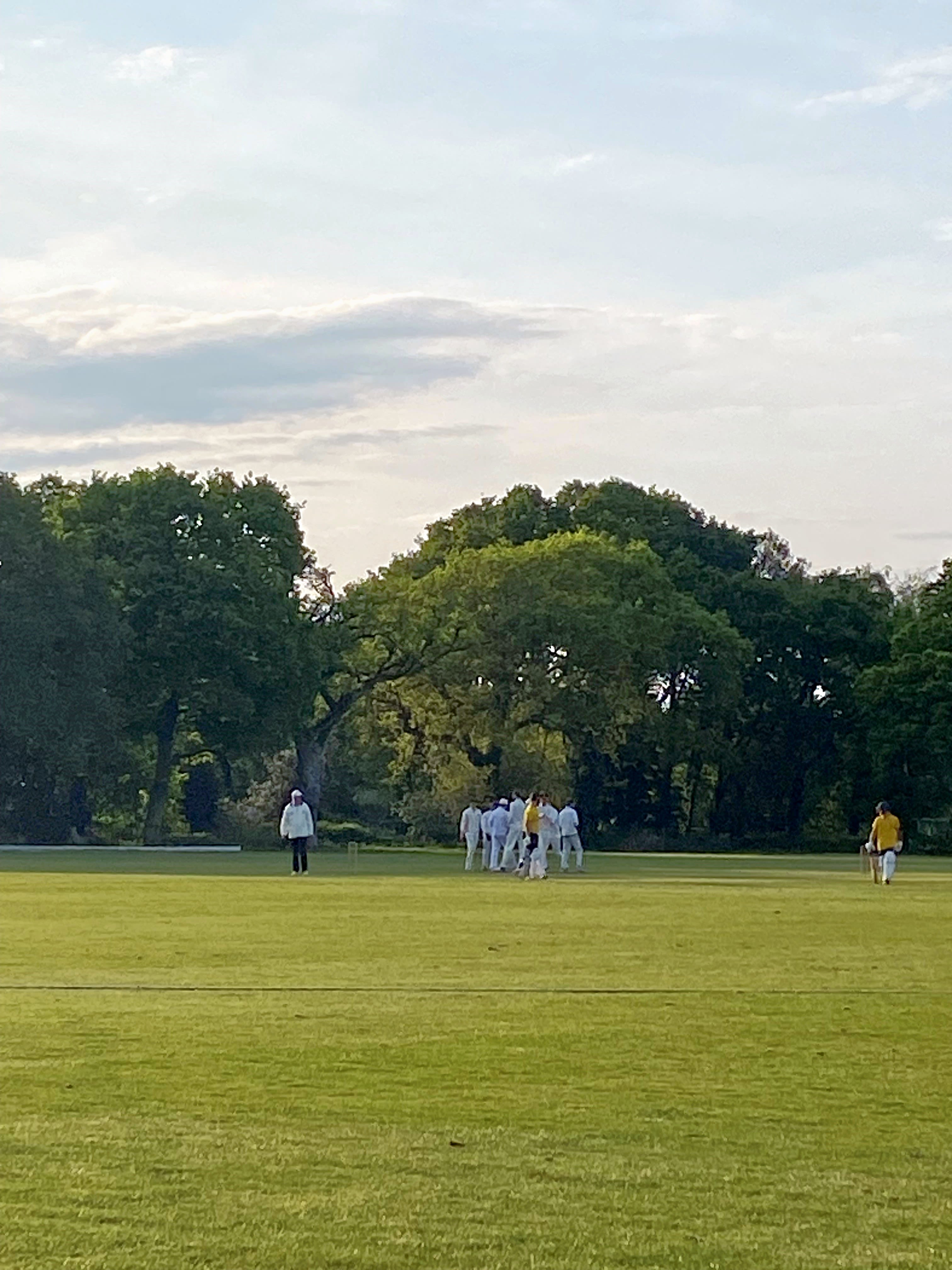 The team in a huddle at a break in the game