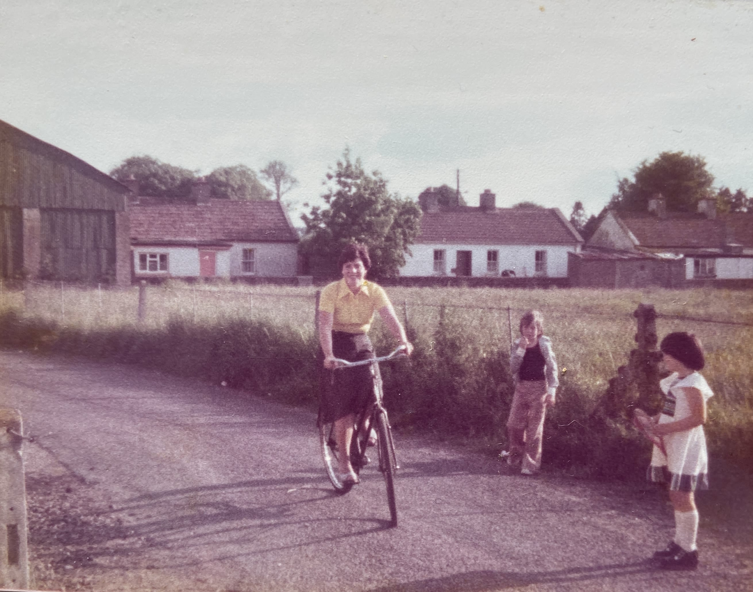 Alice riding her bike through the Commons