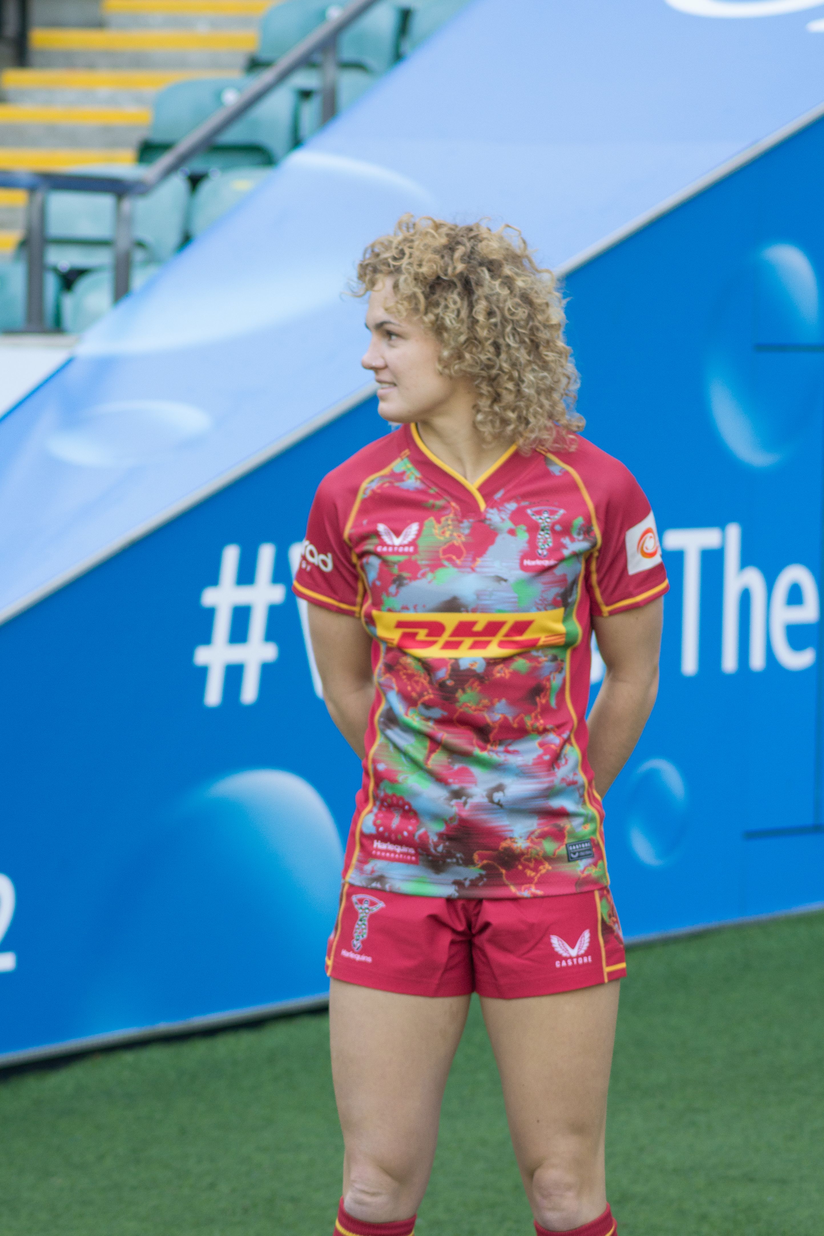 Ellie Kildunne in her harlequins kit in front of the tunnel at Twickenham Stadium.