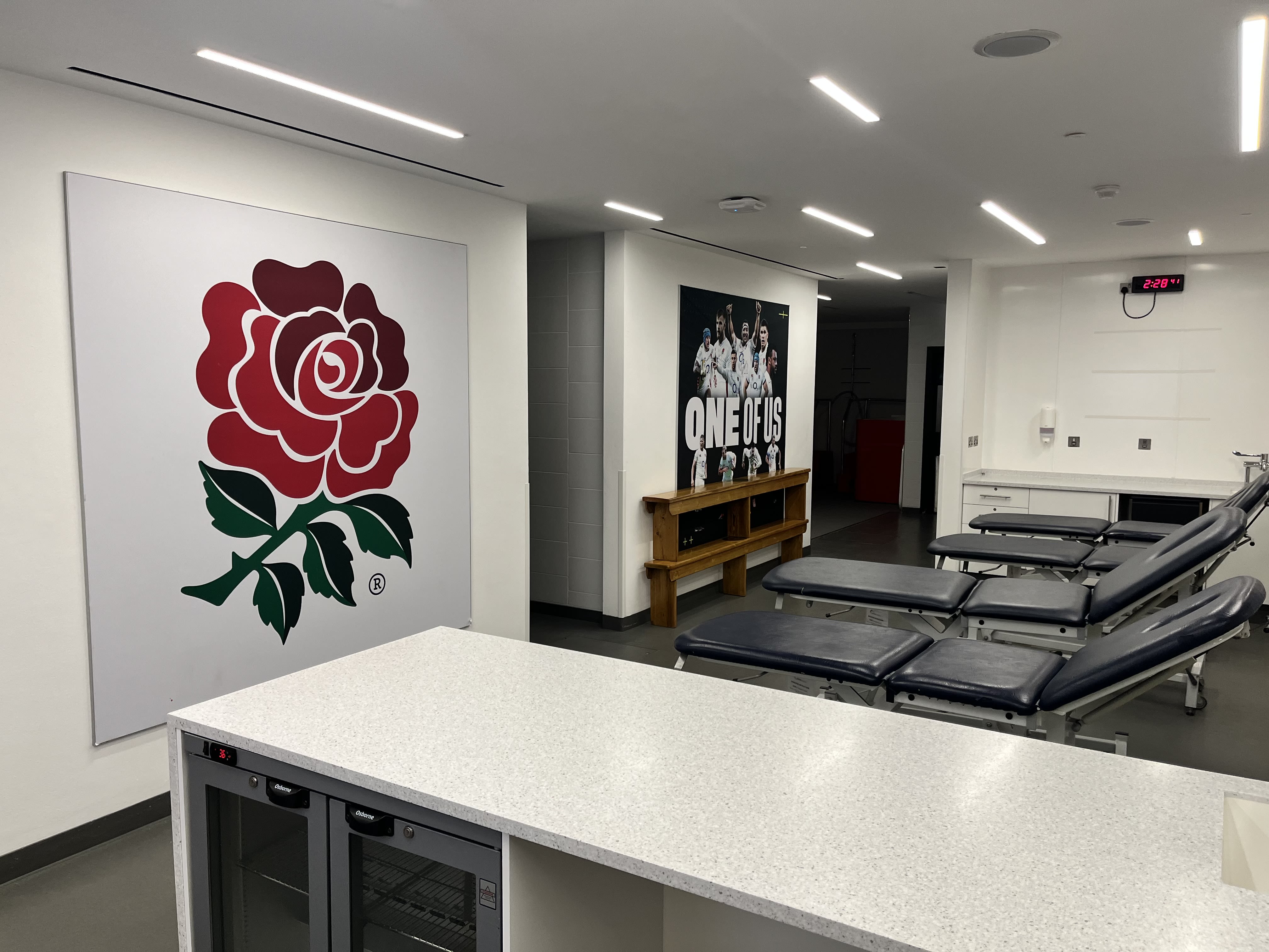 England changing rooms at Twickenham Stadium with physio benches.
