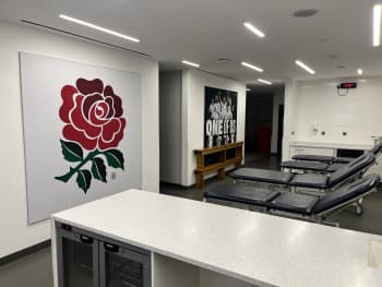England changing rooms at Twickenham Stadium with physio benches.