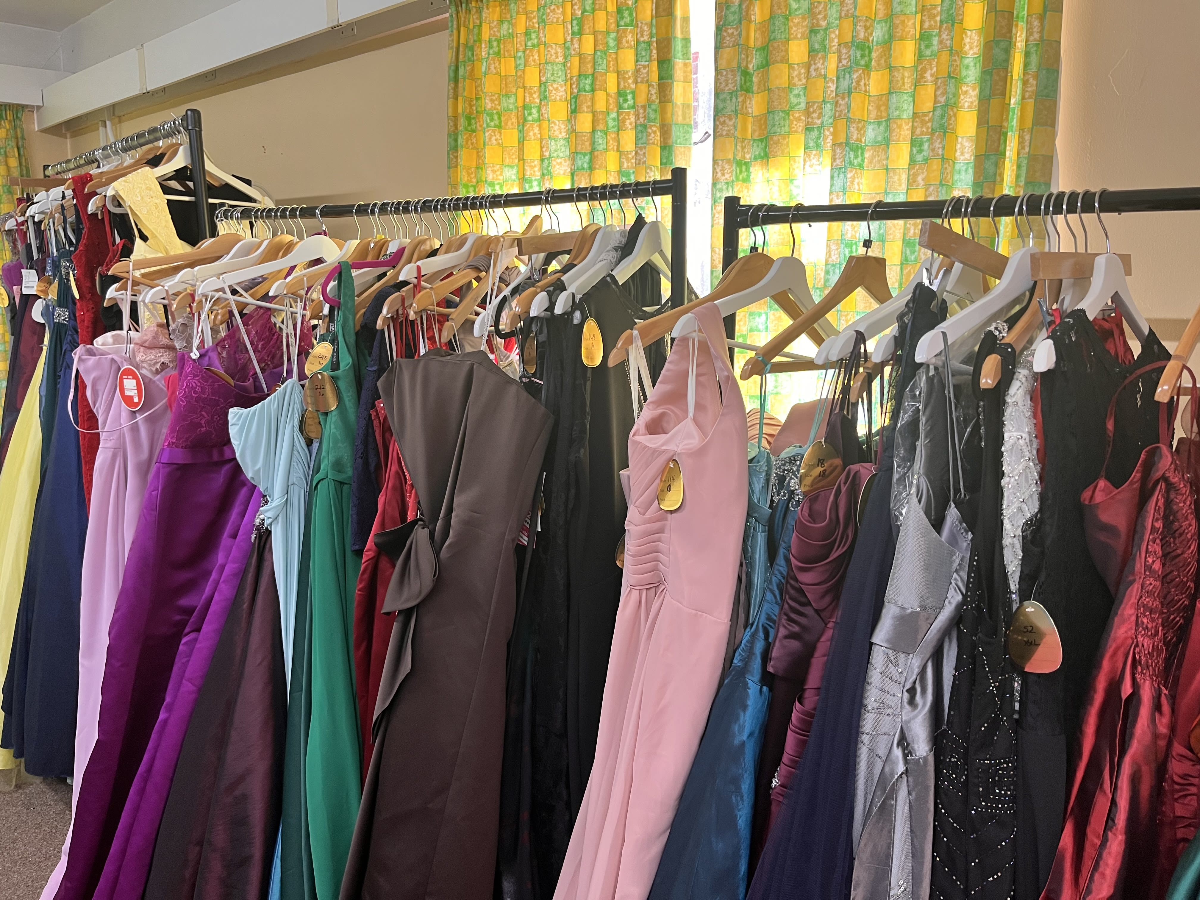 Photo of prom dresses sized 16 to 22