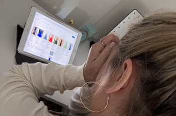 Woman looking stressed about buying prom dresses