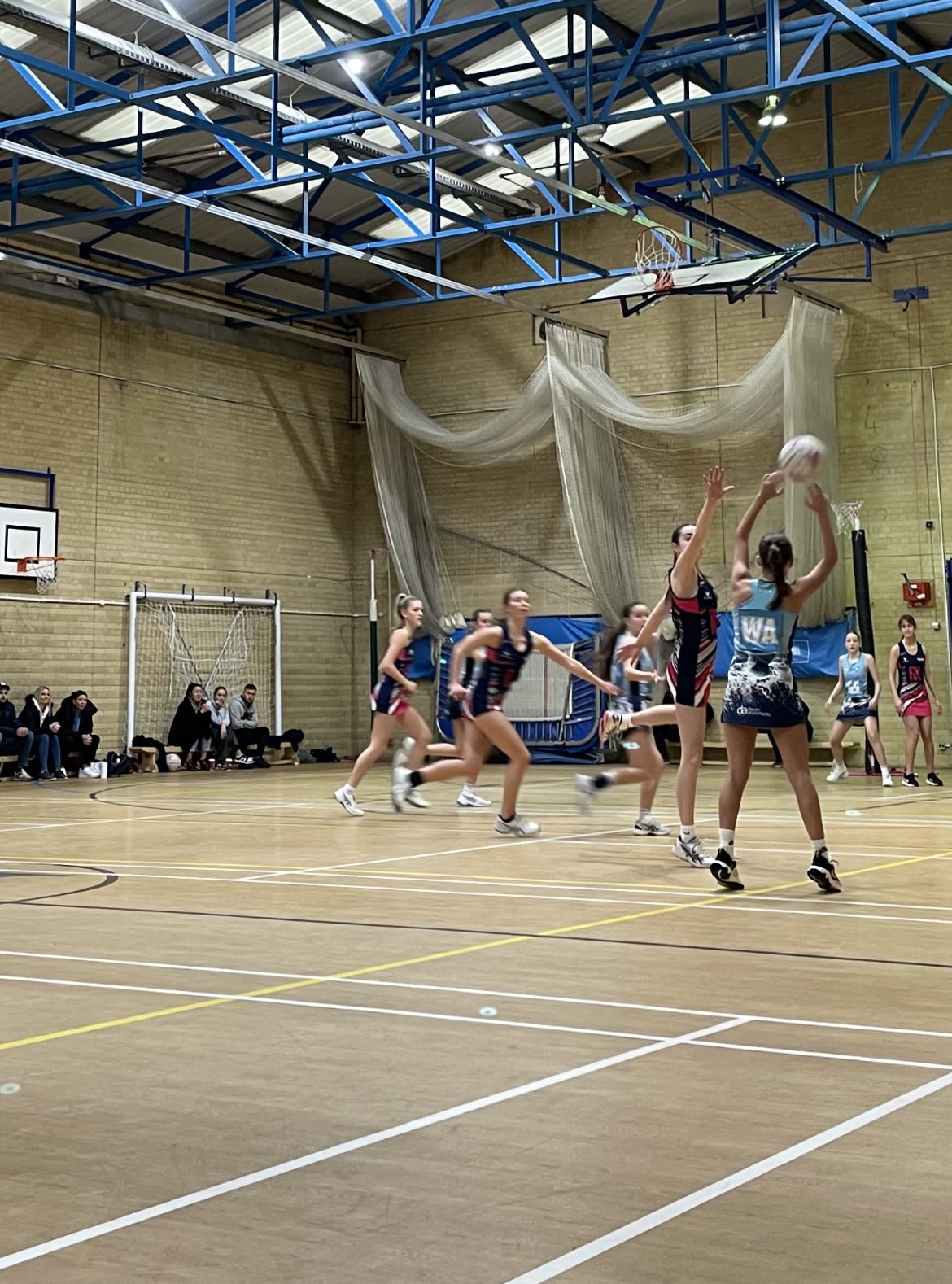 Netball play, by Libby Evans