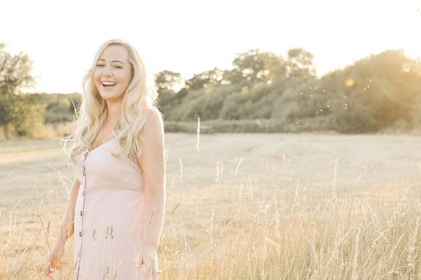 Photo of interviewee Charlotte Valentine in a field. 