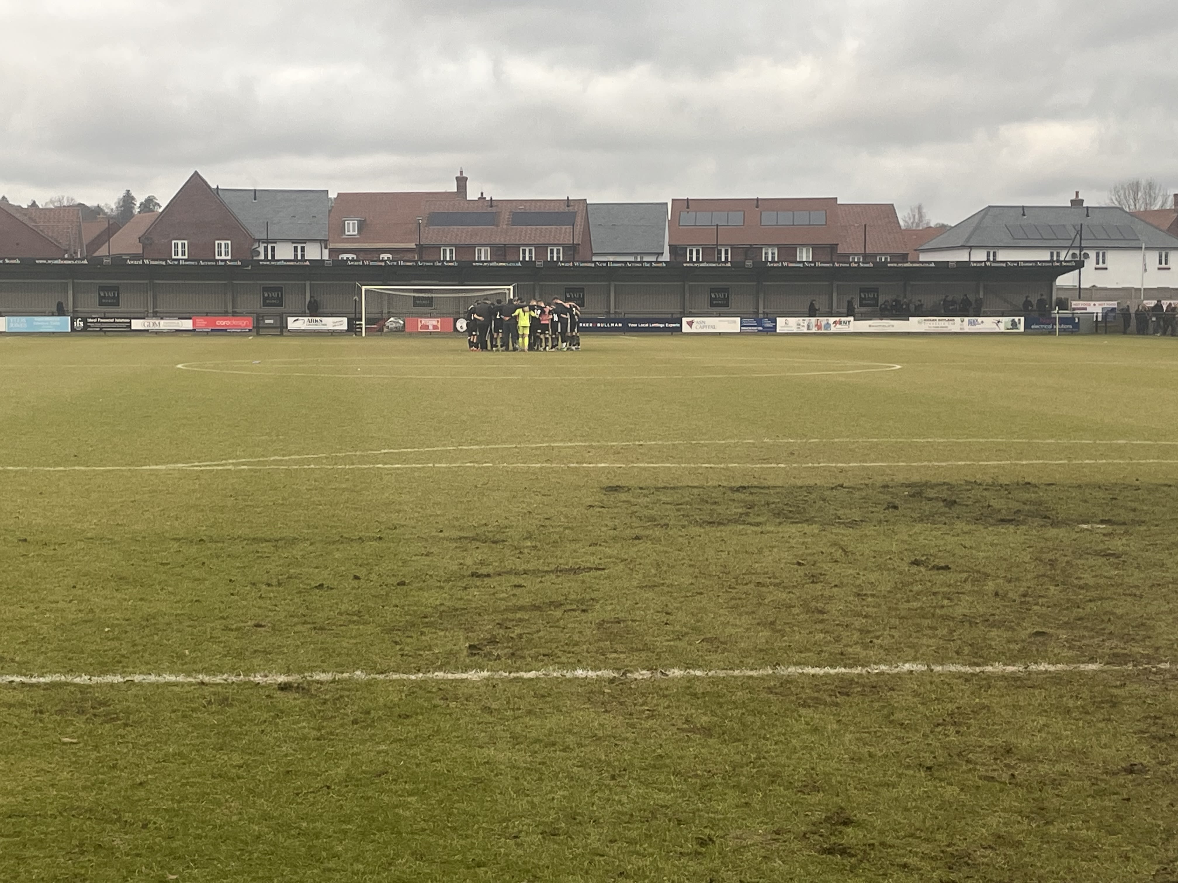 A post-match huddle | Photo by Jimmy Bowie